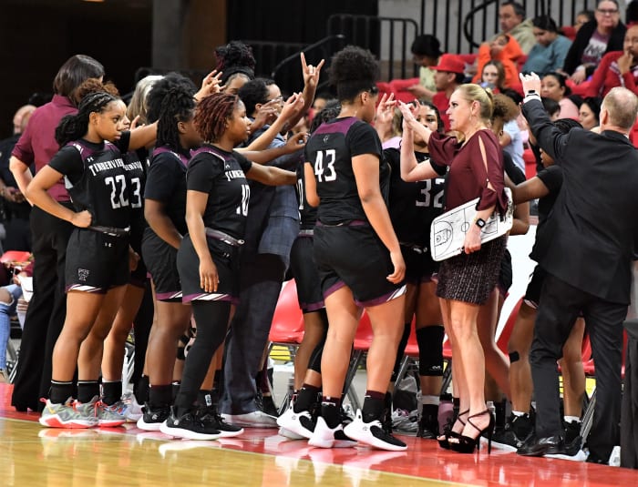 Mansfield Timberview huddles up during their game against Lubbock-Monterey during the Region I-5A Girls Basketball Tournament at Kay Yeager on Friday, February 24, 2023.